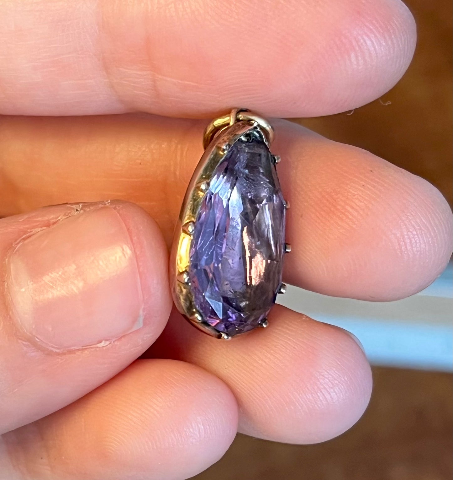 Chipped Georgian foiled-back amethyst teardrop pendant in cut down collet setting