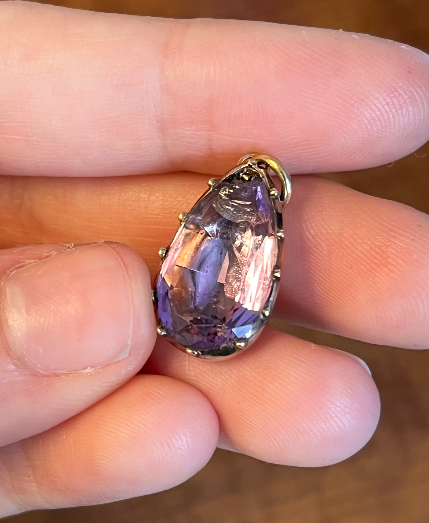 Chipped Georgian foiled-back amethyst teardrop pendant in cut down collet setting