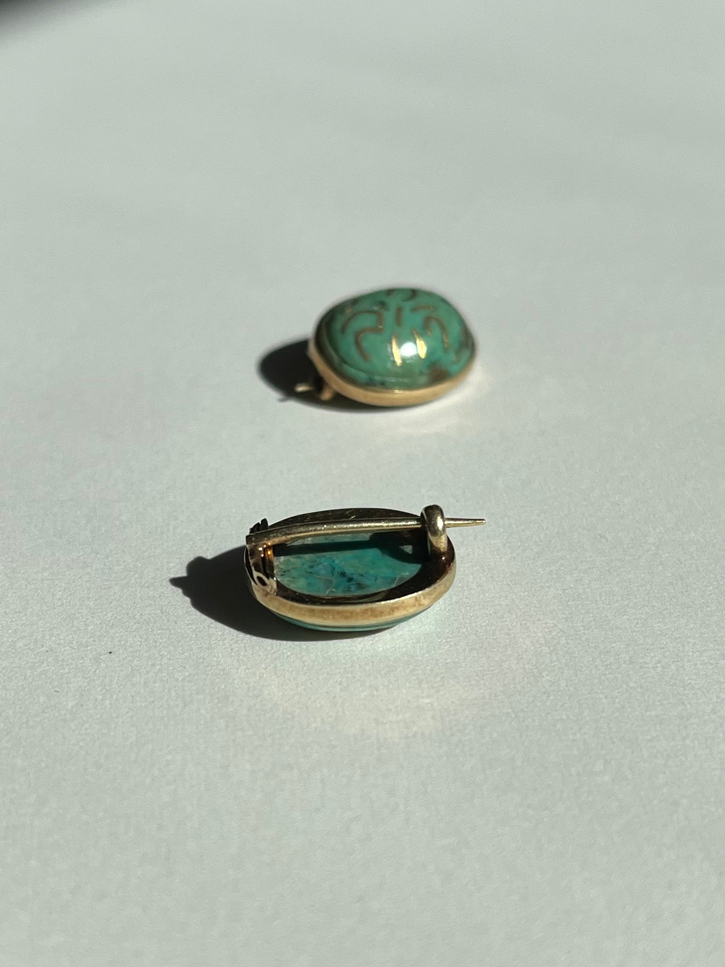 Antique Pair of Turquoise And Gold Inlay Brooches