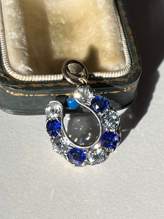 Antique 10K Rosy Gold and Sterling Horseshoe Pendant with White Sapphires and Blue Paste